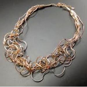 Howard Neckles, tri color, New without tag, never used.